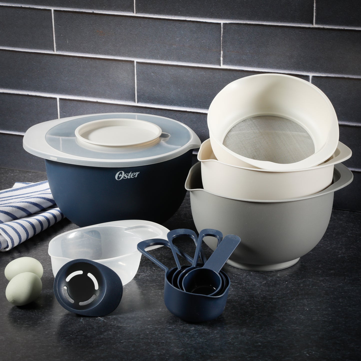 OSTER SET 12 PZAS BOWLS Y UTENSILIOS + RECETARIO